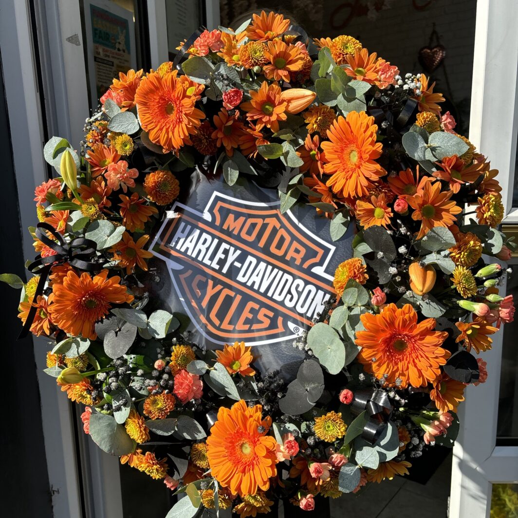 Motorbike funeral flower tribute.